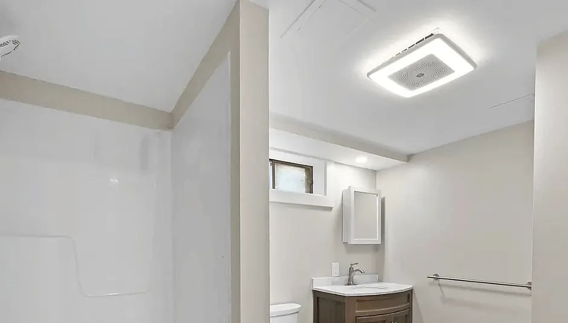 Dated bathroom rebuilt from the studs