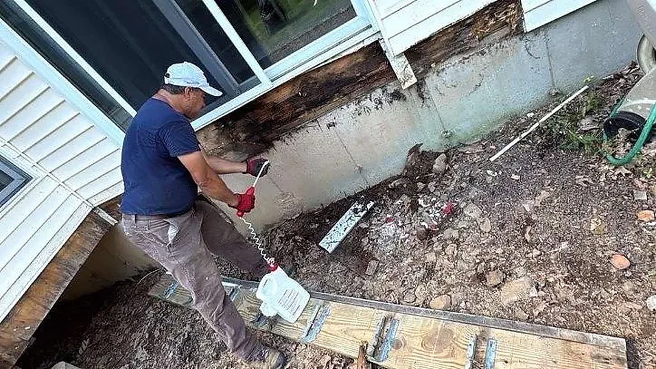 Rebuilt: Rotted sill beam found behind the siding